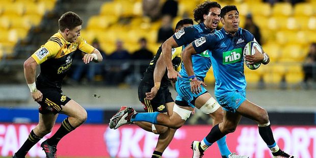 Melani Nanai of the Blues makes a break against the Hurricanes. Photo / Getty