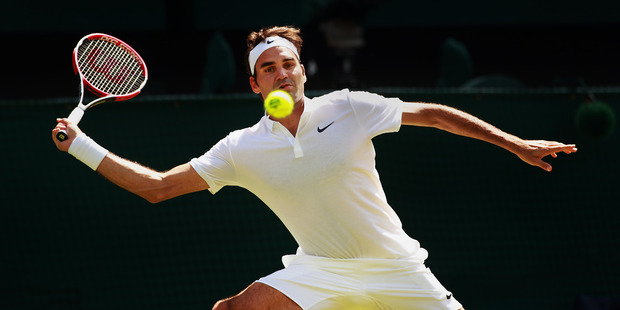 Roger Federer plays a forehand during his match against Marin Cilic. Photo / Getty Images