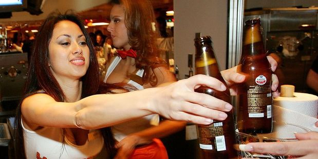 A bartender serves drinks at the Hooters Restaurant during the grand opening of the Hooters Casino Hotel February 2, 2006 in Las Vegas. Photo / Getty Images