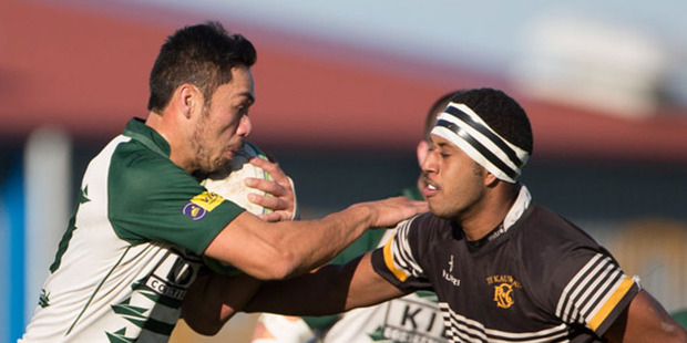 Manurewa, in green and white, crushed Te Kauwhata 60-8 in Counties Manukau premier club action. Photo/Richard Spranger