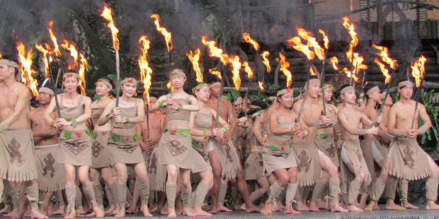Part of the cultural performance at Binglanggu village. Photo / Rod Pascoe