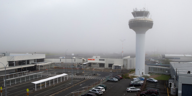 A blanket of fog over Auckland International Airport is causing flight delays and cancellations. Photo / Mark Mitchell