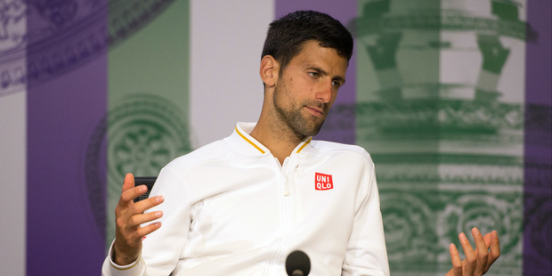 Novak Djokovic of Serbia gestures during a press conference, after being defeated by Sam Querrey of the U.S in their men's singles match on day six of Wimbledon. Photo / AP.