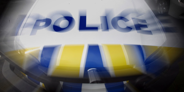 The female motorist was attacked after she pulled to the side of the road to adjust her stereo. Photo / File