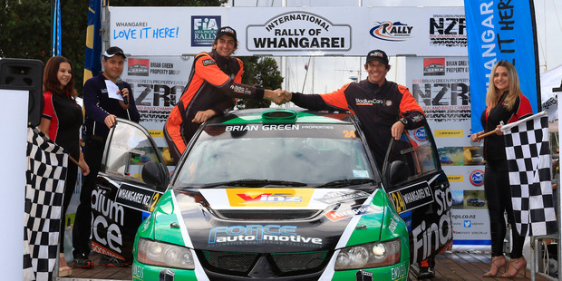 Championship leaders David Holder and Jason Farmer celebrate their first NZRC victory at Rally Whangarei earlier thsi year. PHOTO/GREG HENDERSON PHOTOGRAPHY