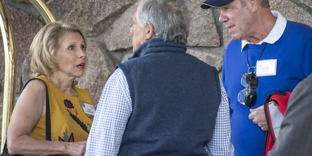 Shari Redstone, vice chairman of Viacom, from left, speaks with Les Moonves, president and chief executive officer of CBS, and Michael Eisner. Photo / David Paul Morris