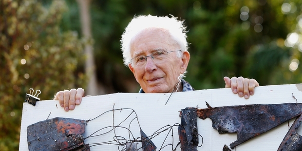 BURNED OUT INCENTIVE: Malcolm Ford with the charred remains of his first copper concorde sculpture, which he hopes will inspire him on his second version of the intricate work. PHOTO/MICHAEL CUNNINGHAM