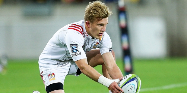 Damian McKenzie wants to kick on in Dunedin. Photo / Getty Images