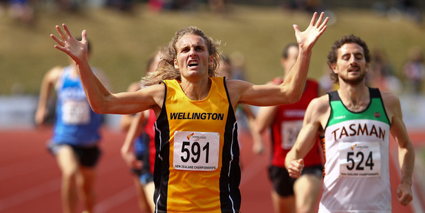 Hamish Carson celebrates winning the 1500m at the New Zealand track and field champs. Photo / Getty Images