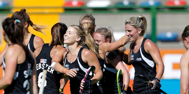Anita Punt and teammates celebrate their team's first goal against Great Britain. Photo / Getty Images
