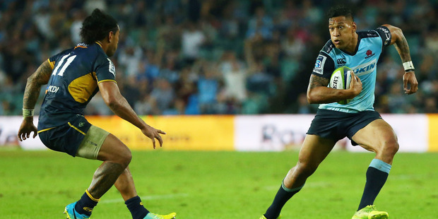 Israel Folau, of the NSW Waratahs, looks to get past ACT Brumbies wing Joe Tomane during round eight of Super Rugby at Allianz Stadium earlier this year. Photo / Getty Images