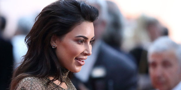 Kim Kardashian turned mobile game magnate has landed the cover of Forbes magazine's July 26 issue. Photo / Getty Images