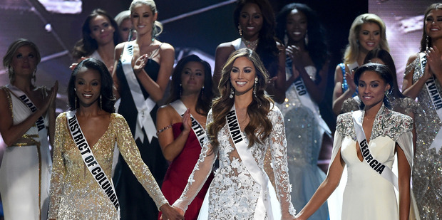 I'm totally against the whole beauty pageant industry that requires women to parade in swimwear and hope to save the world. Photo / Getty