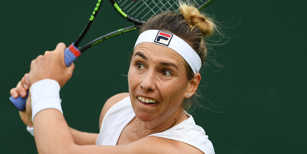Marina Erakovic plays a backhand against Irina Falconi at Wimbledon. Photo / Getty Images