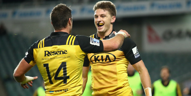 Beauden Barrett celebrates scoring a try with Cory Jane. Photo / Getty Images