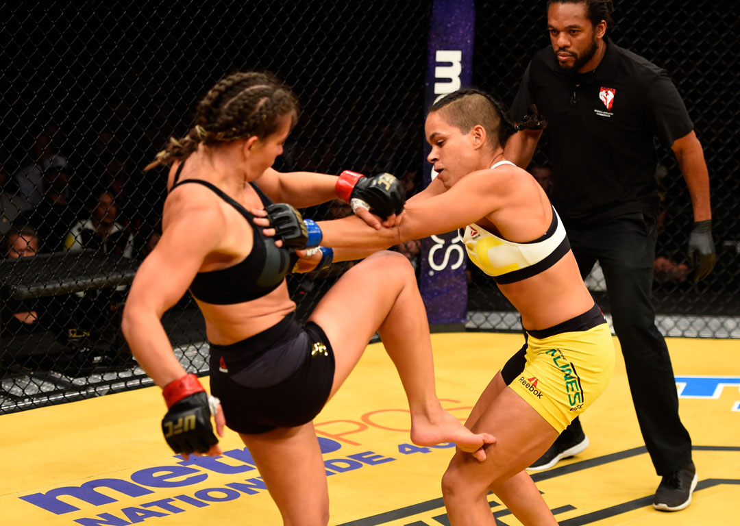 Miesha Tate and Amanda Nunes at UFC 200. Photo / Getty