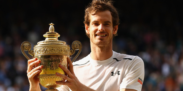 Andy Murray lifts the trophy following victory at Wimbledon. Photo / Getty Images