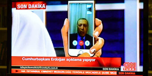 Turkish President Recep Tayyip Erdogan speaks on CnnTurk via facetime. Photo / Getty Images
