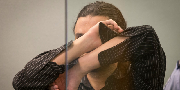 Michael Stevens covered his face throughout today's sentencing. Photo / Greg Bowker