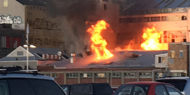 Fire destroyed a large, unoccupied building in Christchurch last night. Photo / ZB News