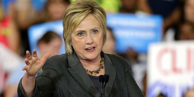 Hillary Clinton got Bernie Sanders' support by moving left on healthcare and the minimum wage. Photo / AP