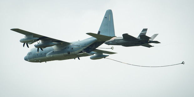 The Pratt & Whitney powered F-35 Lightning II simulates an aerial refuelling by a KC-130J aircraft during its first appearance at the Farnborough Air Show. Photo / AP