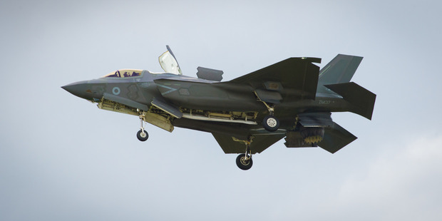 The F-35 Lightning II hovers in front of crowds during its first solo appearance at the Farnborough Air Show. Photo / AP