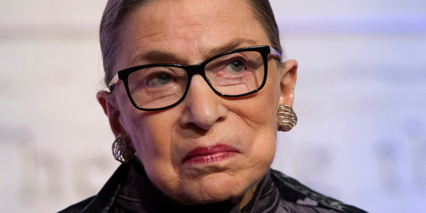 Political and legal commentators in the United States are baying for the blood of US Supreme Court judge Ruth Bader Ginsburg following her joke about moving to New Zealand. Photo / AP