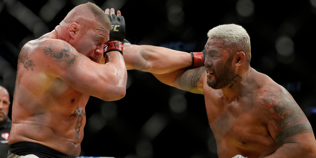 Brock Lesnar fights Mark Hunt during their heavyweight mixed martial arts bout at UFC 200. Photo / AP