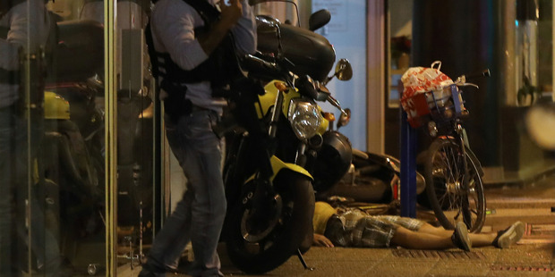 The body of a person on the ground after a van drove into a crowd watching a fireworks display in the French Riviera town of Nice. Photo / Getty