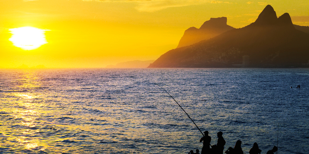 Be sure to watch the sunset at Arpoador beach. Photo / iStock
