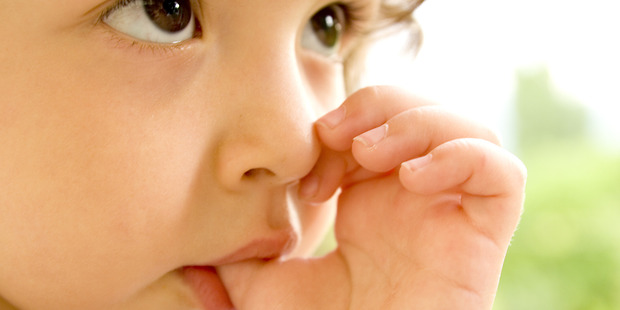 Children that sucked their thumbs or bit their nails suffer fewer allergies later in life, a new study suggests. Photo / iStock