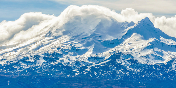 All three peaks in the Tongariro National Park - Ruapehu, Ngauruhoe and Tongariro - are now considered hazardous. Photo / iStock
