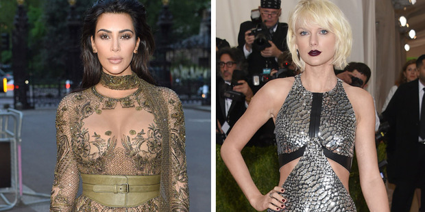 Kim Kardashian has had enough of Taylor Swift "playing the victim". Photos / Getty Images
