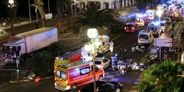 Emergency services at the scene. Photo / AP