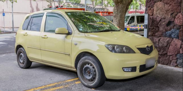 A yellow Mazda Demio car is being held in connection with the murder of Jo Pert. Photo / Supplied, NZ Police