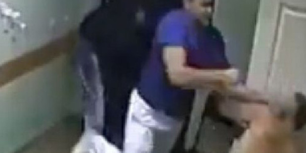 CCTV footgage shows the doctor striking the patient and knocking him to the floor. Photo / YouTube