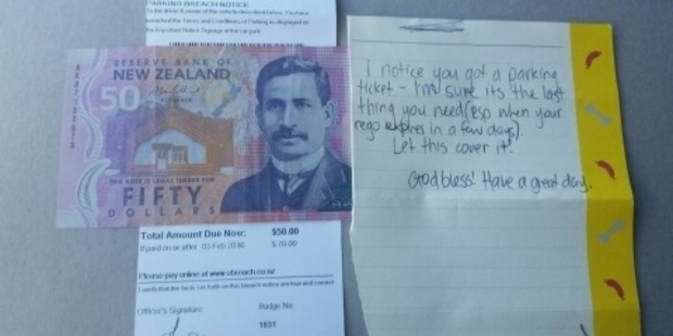 Tucked under the parking ticket was a note and $50, left by a stranger.