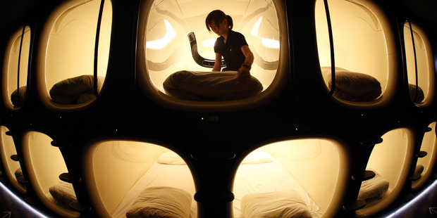 Narita Airport, Japan, has a capsule hotel that offers travelers small pods to sleep in. Photo / Getty