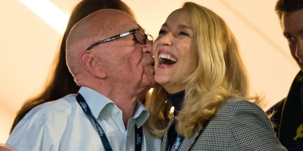 Rupert Murdoch and Jerry Hall share a very public kiss at the 2015 Rugby World Cup Final match. Photo / Getty Images