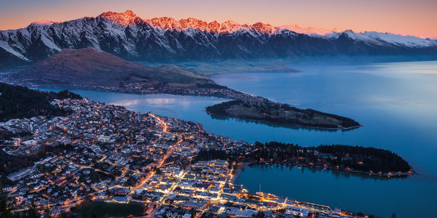 Queenstown and the Remarkables at sunset, as viewed from Bob's Peak. Photo / Sarah Sisson