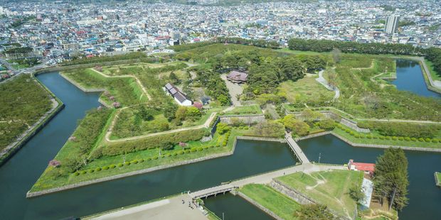 The star-shaped Goryokaku Fort in Hakodate is lined with cherry blossoms in Spring. Photo /123RF