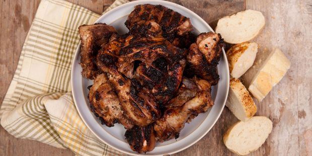 Try authentic jerk chicken while on holiday in Jamaica. Food / 123RF