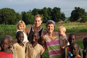 Zoe, Jono, Destinee and Ellisha Macleod with some of the many boys who follow them around during the day in Tonj, 2015. Photo/supplied