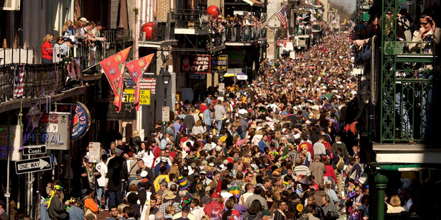 Revelers pack the French Quarter's famous Bourbon Street during the annual Mardi Gras celebration in New Orleans. Photo / AP