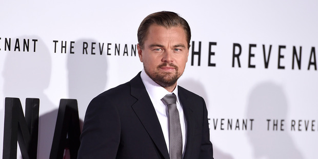 Leonardo DiCaprio paid a huge sum for U2 lead singer Bono's guitar in the name of charity.