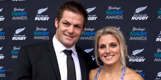 Richie McCaw with Gemma Flynn on the red carpet during the 2014 Steinlager Rugby Awards. Photo / Dean Purcell