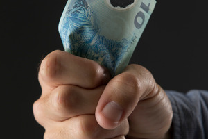 Be cautious about buying shares overseas or giving money to anyone you have not met in person, warn police. Photo / Nick Reed