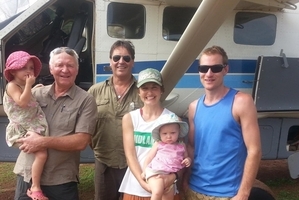 Bryan Archer holding his granddaughter Zoe, 3, Richard Welch, Destinee holding Ellisha, 1, and Jono Macleod when Bryan and Richard arrived in Tonj in 2015. Photo/Supplied
