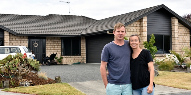 Georgia and Alistair Williams in front of their Papamoa home. Photo/George Novak
